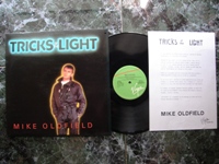 1984 Tricks of the Light / Tricks of the Light (Instrumental) / Afghan F-601520 + INFO SHEET.