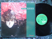 1989 Innocent / Innocent (7'' Version) / Earth Moving F-612383.