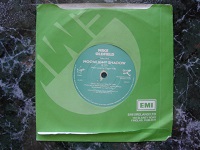 1983 Moonlight Shadow / Rite of Man VS586 (both labels light green).