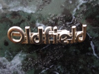 Mike Oldfield Crises badge.